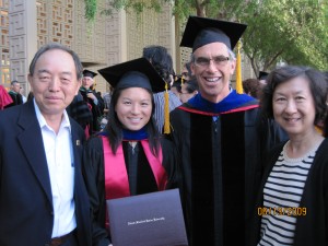 With my parents and my advisor after receiving my diploma